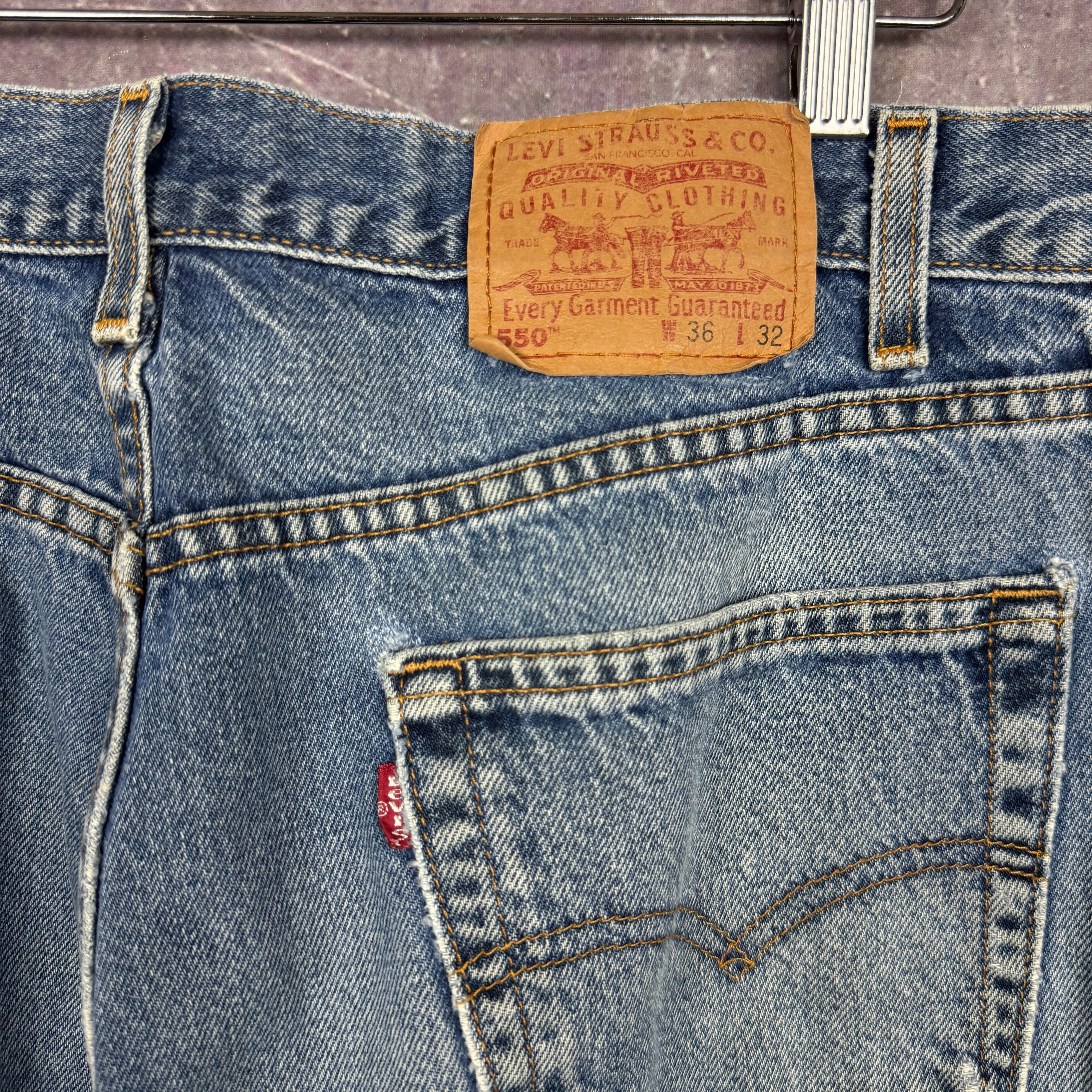 90s Medium Wash Distressed Levi's 550 Denim Jeans 35x32.5 0682
