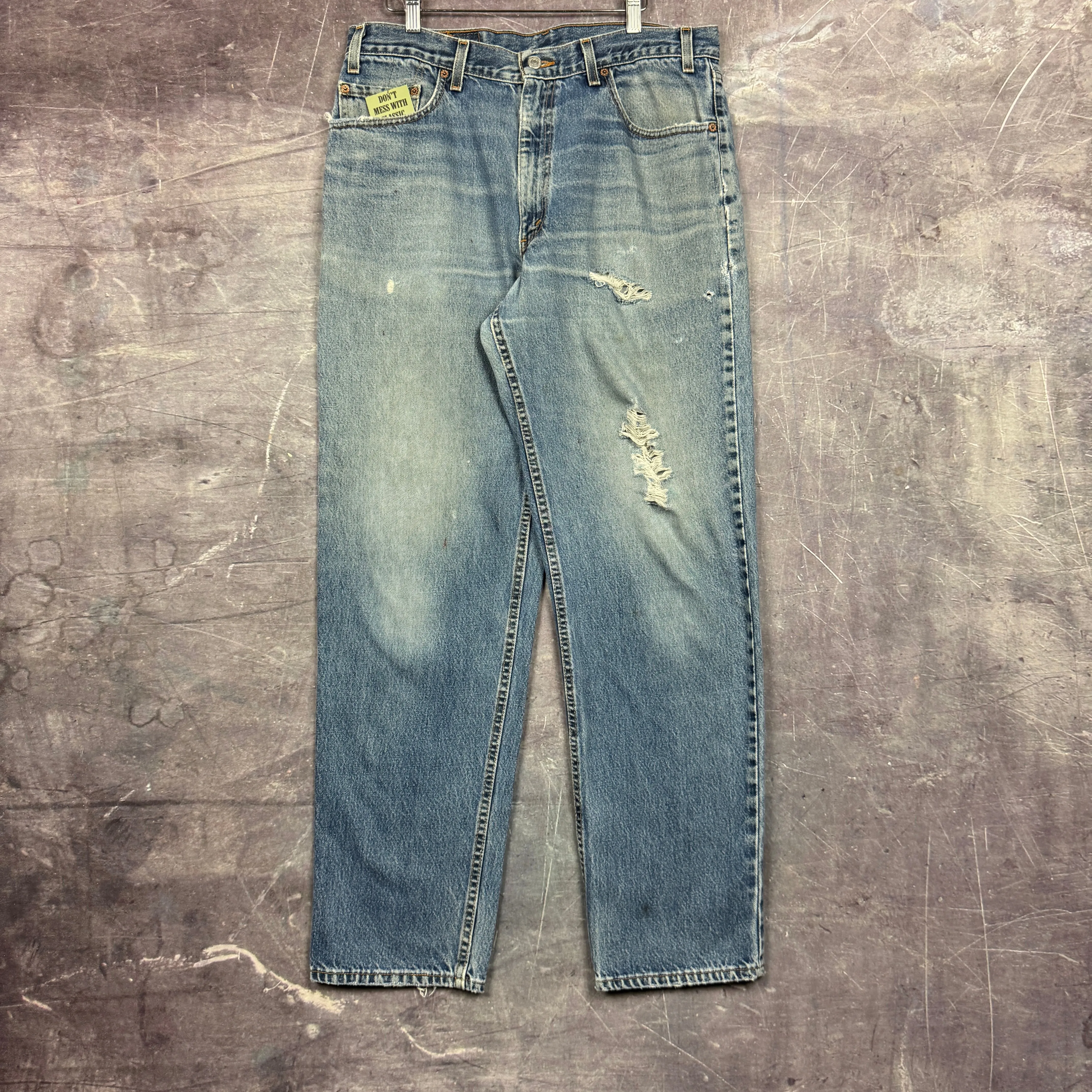 90s Medium Wash Distressed Levi's 550 Denim Jeans 35x32.5 0682