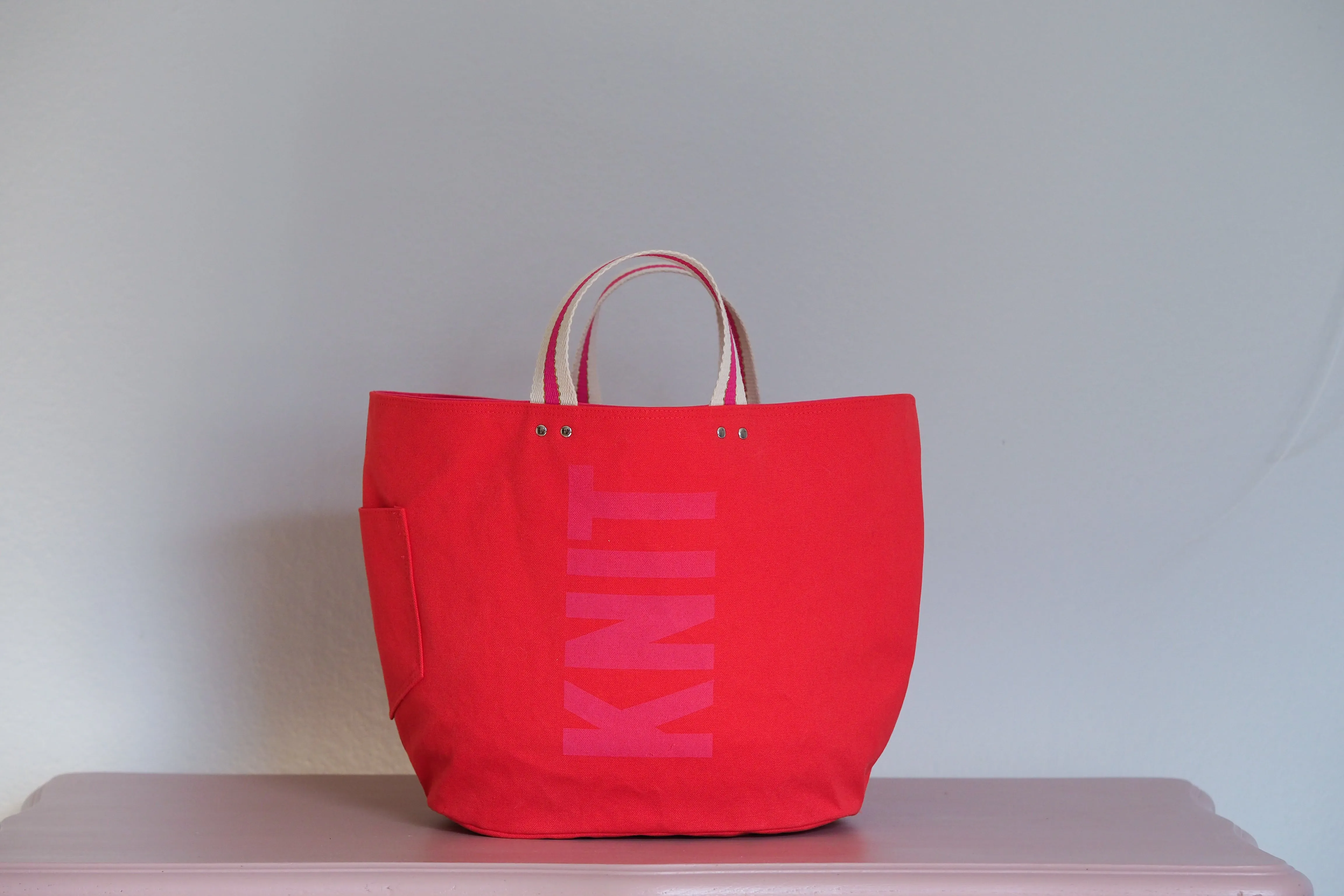 PRE ORDER UPDATE Tote Bag - Red - printed pink (low contrast)